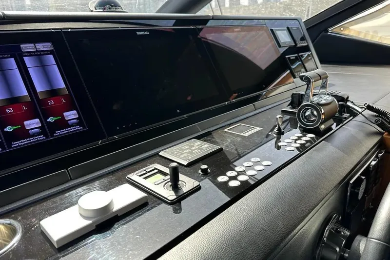  Yacht Photos Pics Control panel of a 2018 Sunseeker 95 yacht with advanced navigation systems.