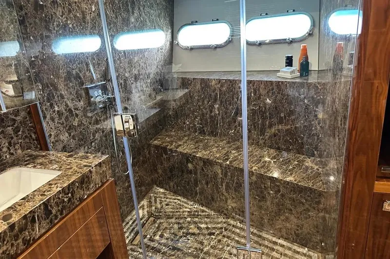  Yacht Photos Pics Luxurious marble bathroom interior on a 2018 Sunseeker 95 yacht.