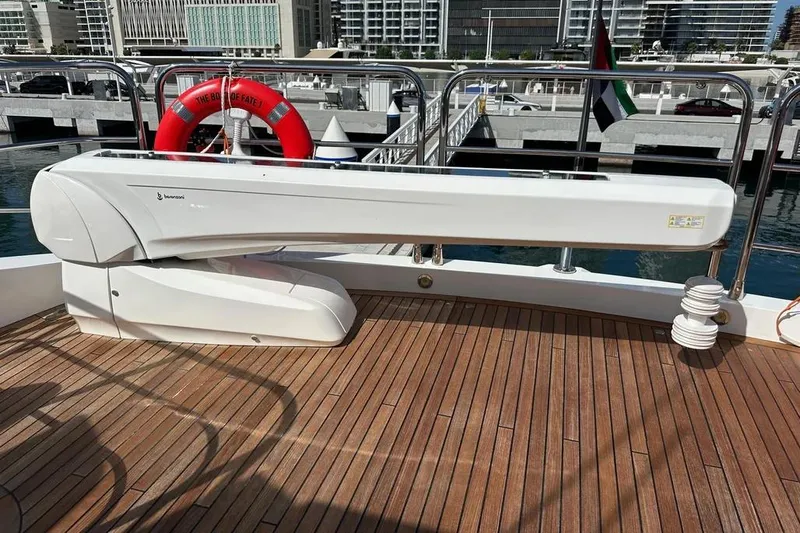  Yacht Photos Pics 2018 Sunseeker 95 yacht deck with davit crane and wooden flooring.