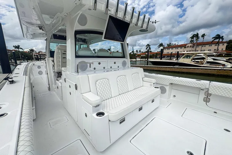 Our Trade Yacht Photos Pics 2024 HCB 53 Sueños luxury boat interior with white seating and modern amenities.
