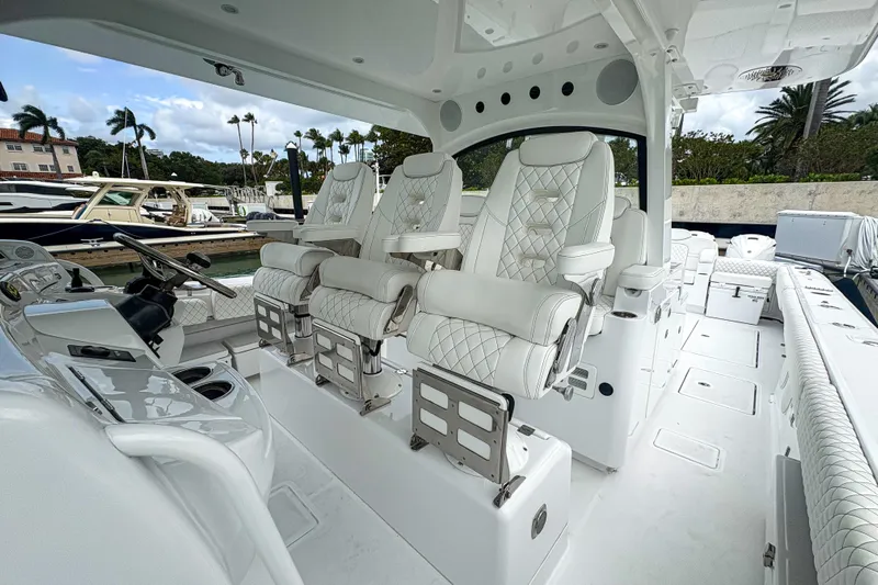 Our Trade Yacht Photos Pics Luxurious interior of 2024 HCB 53 Sueños yacht with plush seating and modern design.