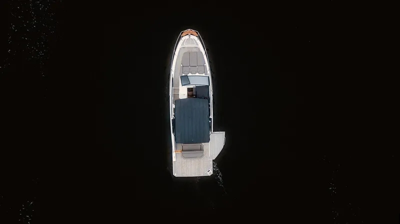 Custom Order Your 347 Today! Yacht Photos Pics Aerial view of 2025 Hanover 347 Inboard boat on dark water.