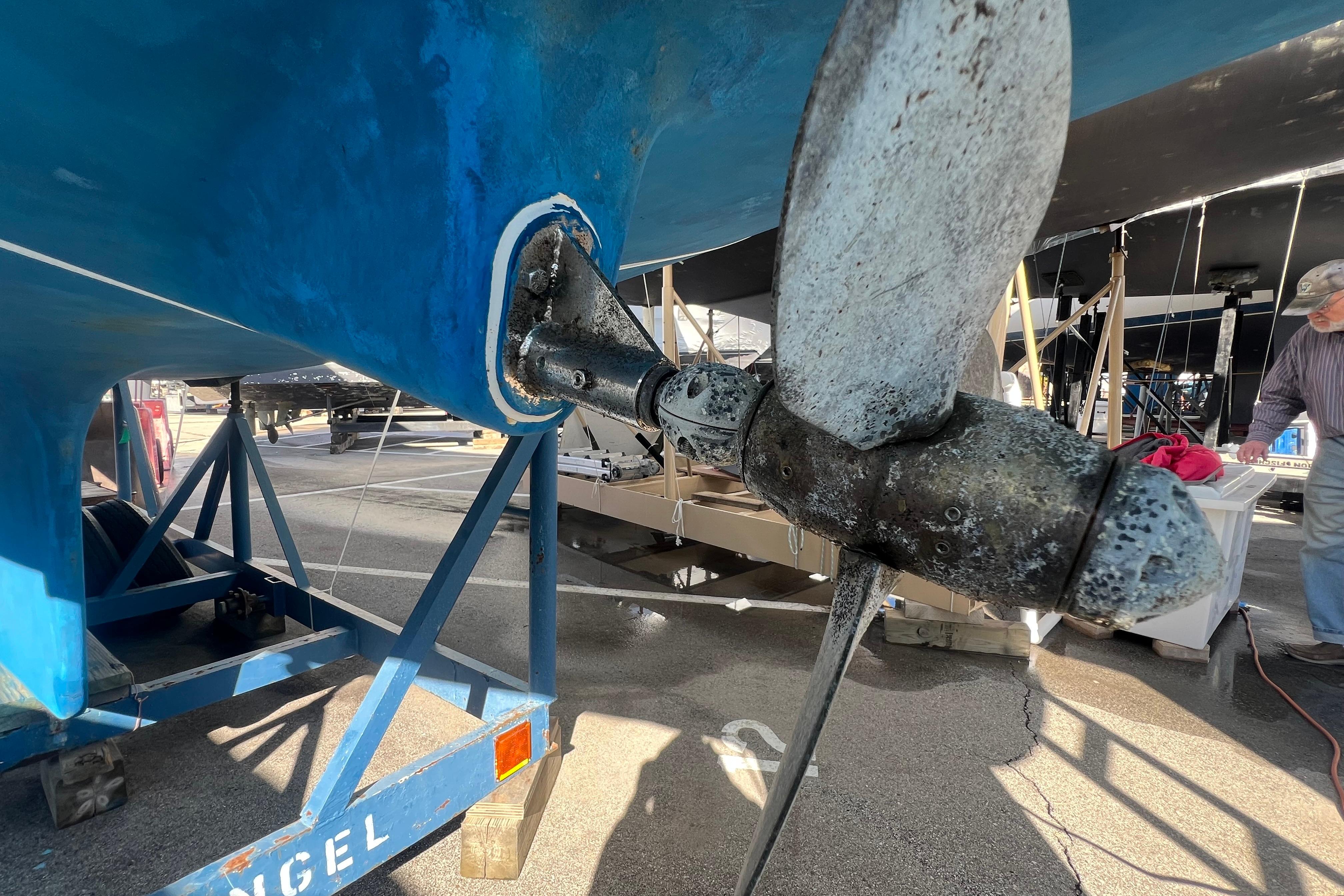 Close-up of a 1996 Caliber 35 LRC sailboat propeller on a trailer.