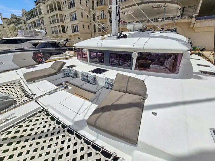 Cool Runnings IV Yacht Photos Pics Luxurious 2015 Lagoon 560 S2 yacht with spacious deck and comfortable seating.