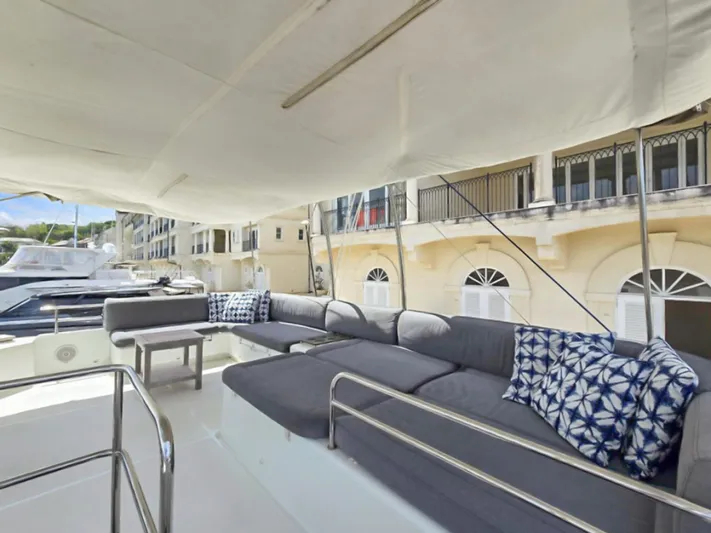Cool Runnings IV Yacht Photos Pics Spacious deck of 2015 Lagoon 560 S2 yacht with comfortable seating and stylish cushions.