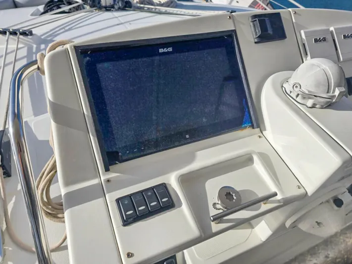 Cool Runnings IV Yacht Photos Pics Control panel of 2015 Lagoon 560 S2 yacht with navigation display and controls.