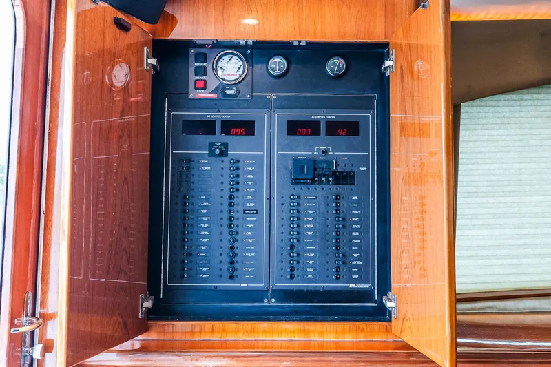 Peeling Drag Yacht Photos Pics Electrical control panel inside a 2003 Egg Harbor 42 Convertible yacht.