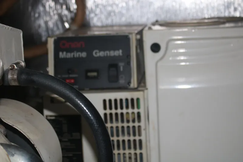 Plane Pirate Yacht Photos Pics Onan Marine Genset in 2004 Riviera 37 Convertible engine room.