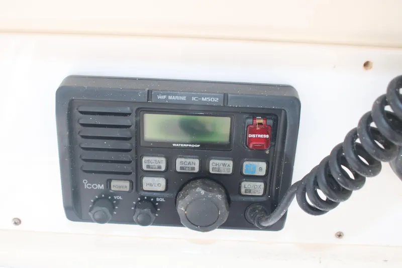 Plane Pirate Yacht Photos Pics VHF marine radio on 2004 Riviera 37 Convertible boat dashboard.