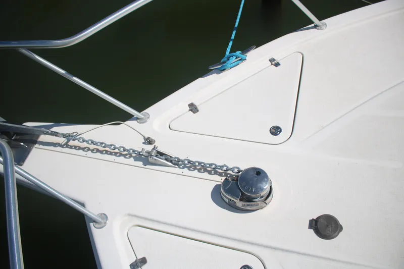Plane Pirate Yacht Photos Pics Bow of 2004 Riviera 37 Convertible yacht with anchor chain and deck fittings.