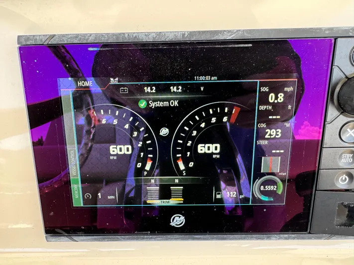 Yacht Photos Pics Dashboard display of a 2018 Boston Whaler 330 Outrage showing system status and RPM gauges.