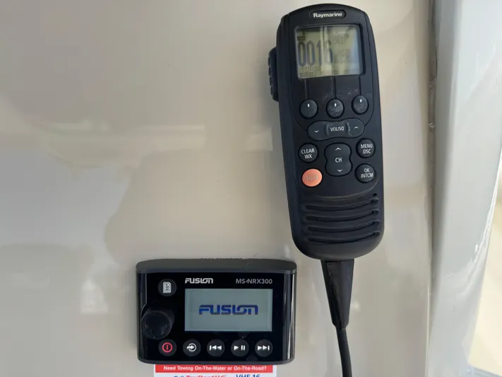  Yacht Photos Pics Control panel of a 2018 Boston Whaler 330 Outrage with Raymarine and Fusion devices.