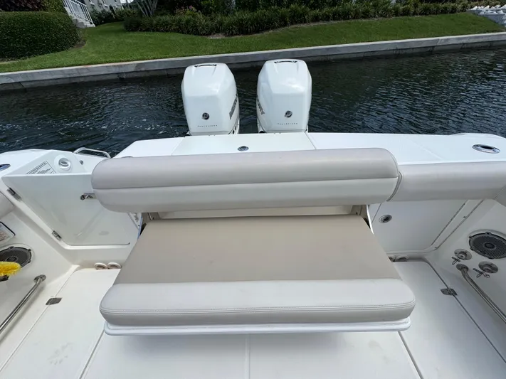  Yacht Photos Pics 2018 Boston Whaler 330 Outrage boat with dual engines and cushioned seating.