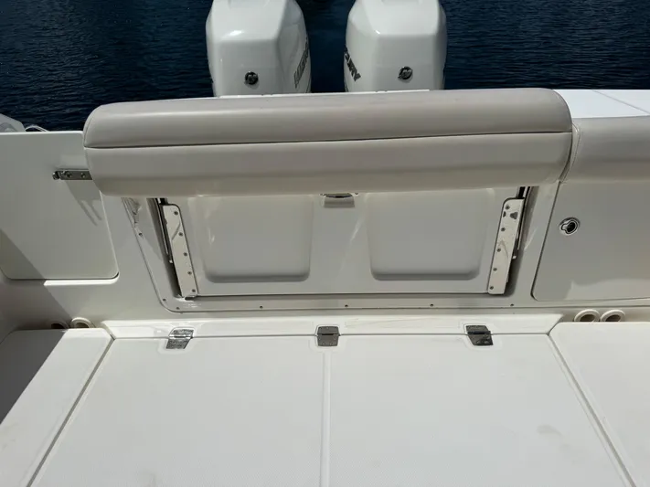  Yacht Photos Pics 2018 Boston Whaler 330 Outrage boat with dual engines and cushioned seating.