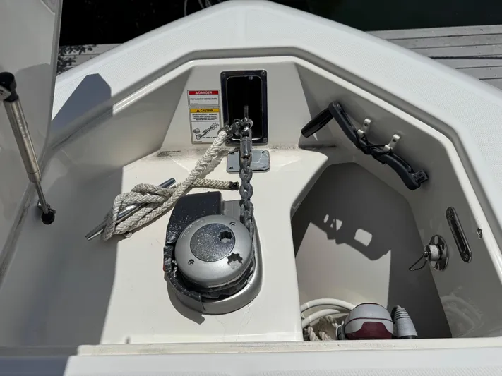  Yacht Photos Pics 2018 Boston Whaler 330 Outrage anchor compartment with chain and rope.