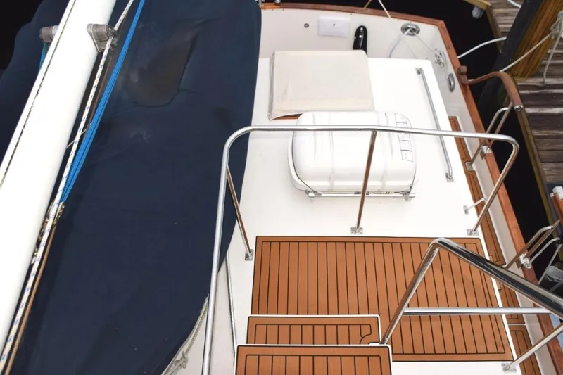 Jamie Lyn Yacht Photos Pics 1997 Grand Banks Classic yacht deck with wooden flooring and safety railings.