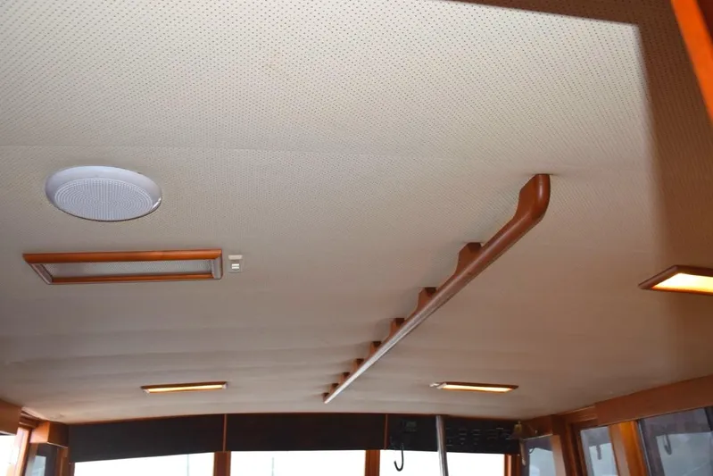 Jamie Lyn Yacht Photos Pics Ceiling interior of 1997 Grand Banks Classic yacht with lighting and speaker.