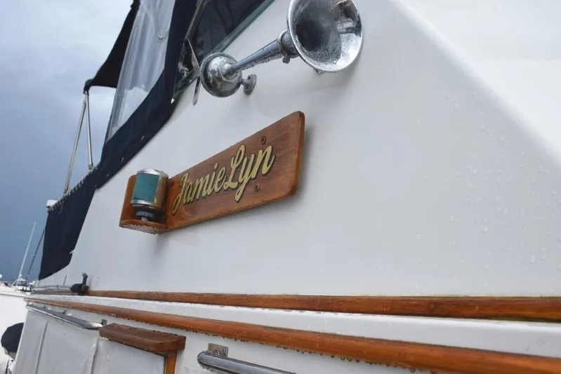 Jamie Lyn Yacht Photos Pics 1997 Grand Banks Classic boat with "JamieLyn" nameplate and nautical details.
