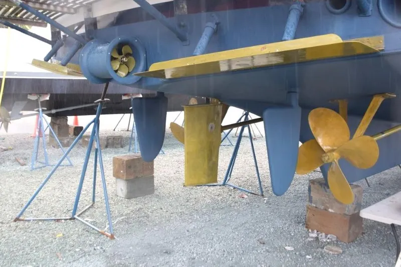 Jamie Lyn Yacht Photos Pics 1997 Grand Banks Classic yacht underbody with propellers and supports in dry dock.