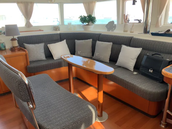  Yacht Photos Pics Interior of 2007 Lagoon 440 yacht with cozy seating and elegant decor.