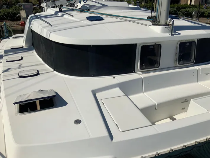  Yacht Photos Pics 2007 Lagoon 440 catamaran deck with hatches and seating area.