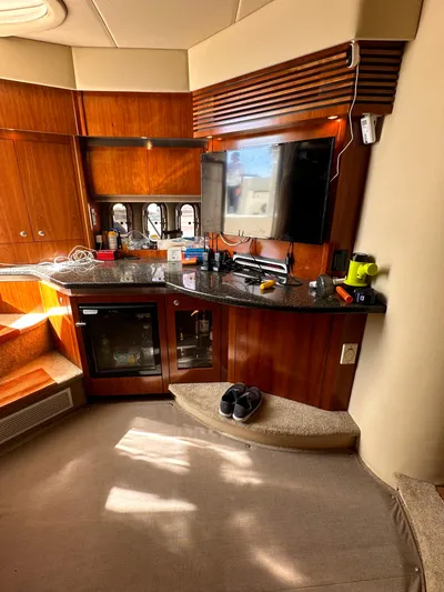 Majestic Yacht Photos Pics Interior of 2006 Cruisers Yachts 420 Express with wood cabinetry and modern amenities.