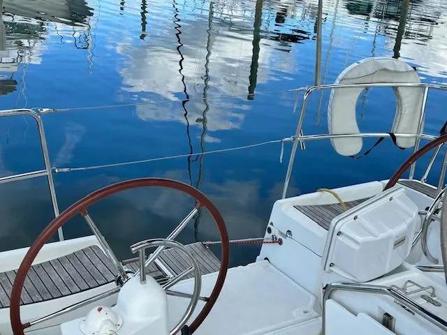 Patience Yacht Photos Pics Cockpit of 2012 Jeanneau Sun Odyssey 379 sailboat with dual steering wheels.