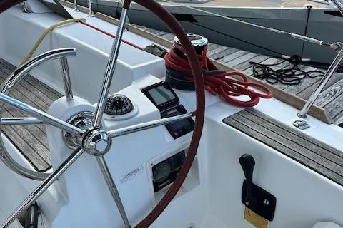 Patience Yacht Photos Pics Steering wheel and controls of a 2012 Jeanneau Sun Odyssey 379 sailboat.