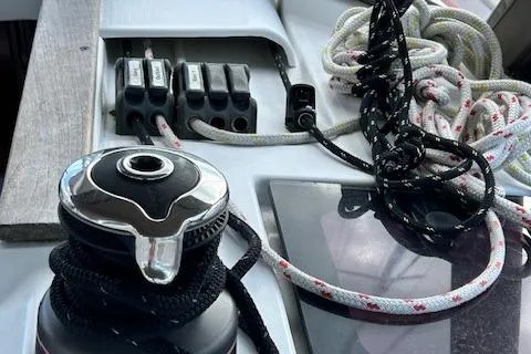 Patience Yacht Photos Pics Deck equipment on a 2012 Jeanneau Sun Odyssey 379 sailboat, featuring winch and ropes.