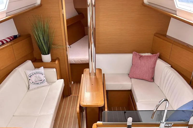 Patience Yacht Photos Pics Interior of 2012 Jeanneau Sun Odyssey 379 yacht with cozy seating and modern design.