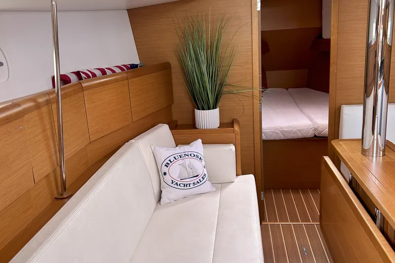 Patience Yacht Photos Pics Interior of 2012 Jeanneau Sun Odyssey 379 yacht with cozy seating and modern decor.