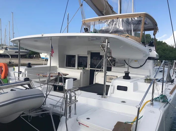 Blue Osprey Yacht Photos Pics 2020 Lagoon 450S catamaran docked, featuring spacious deck and modern design.