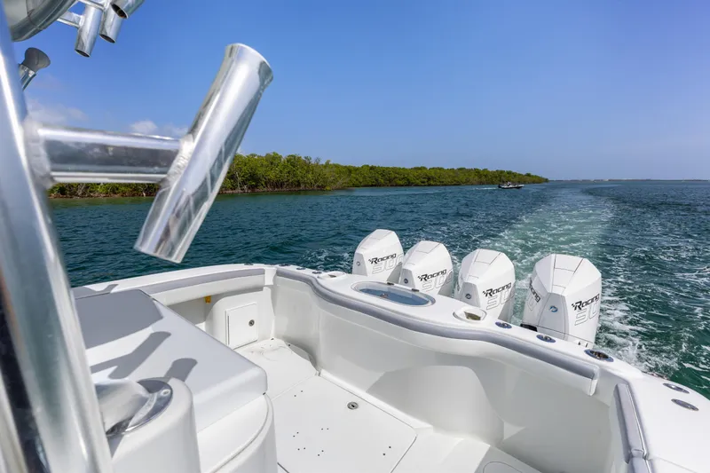  Yacht Photos Pics 2018 Yellowfin 42 Offshore boat cruising on open water with powerful engines.