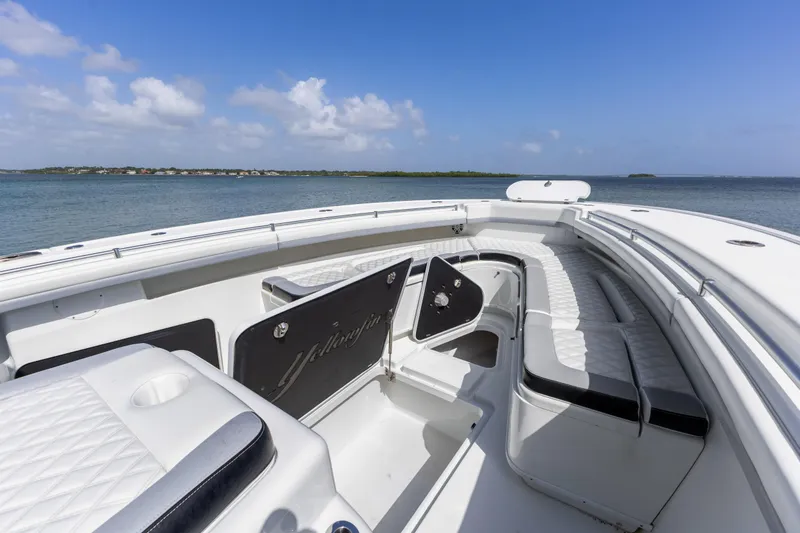  Yacht Photos Pics 2018 Yellowfin 42 Offshore boat interior with seating, ocean view, and clear sky.