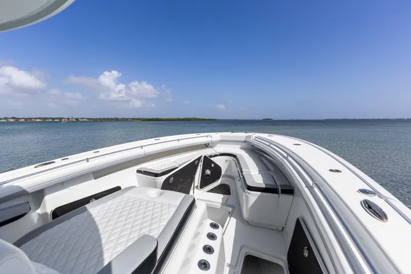  Yacht Photos Pics 2018 Yellowfin 42 Offshore boat interior with ocean view and clear blue sky.