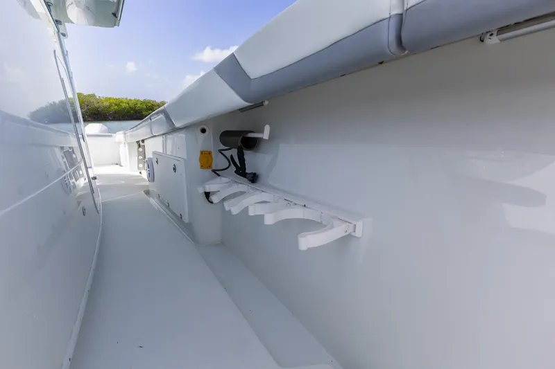  Yacht Photos Pics 2018 Yellowfin 42 Offshore boat interior with rod holders and sleek design.