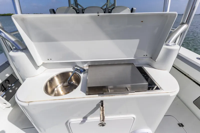  Yacht Photos Pics 2018 Yellowfin 42 Offshore boat with sink and grill station.