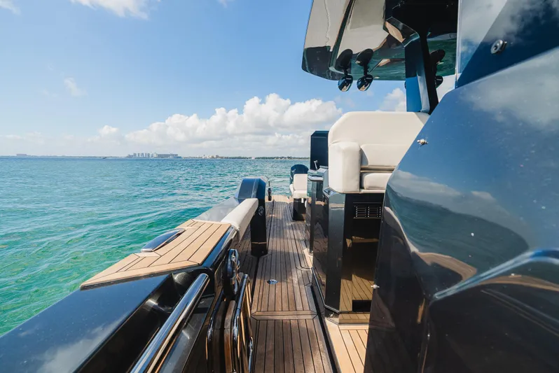 Heavy D Yacht Photos Pics 2023 Pirelli Tecnorib 50 yacht on open water, showcasing sleek design and luxury features.