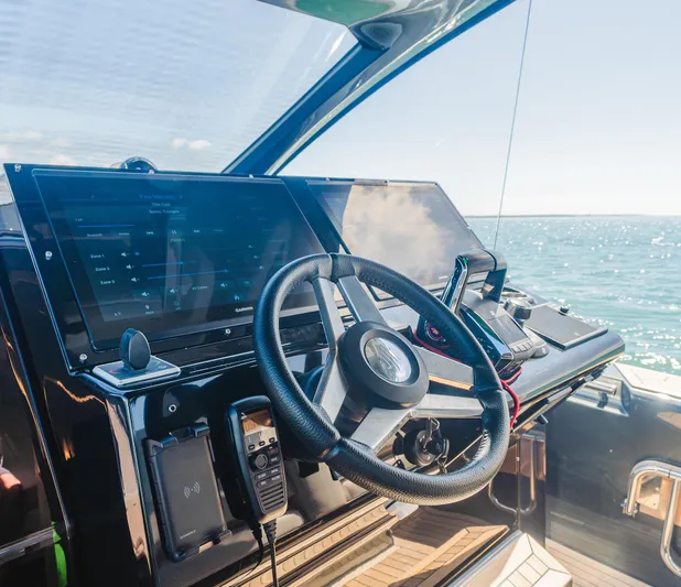 Heavy D Yacht Photos Pics Cockpit of 2023 Pirelli Tecnorib 50 boat with modern navigation equipment.