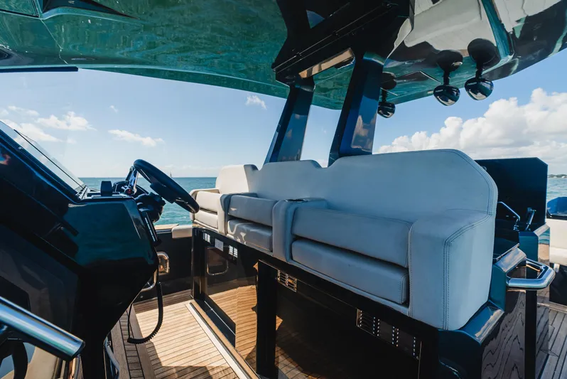 Heavy D Yacht Photos Pics 2023 Pirelli Tecnorib 50 luxury yacht interior with modern seating and ocean view.