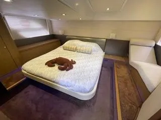 Oasis Yacht Photos Pics Luxurious bedroom interior of 2014 Beneteau Gran Turismo 49 yacht with plush bedding.