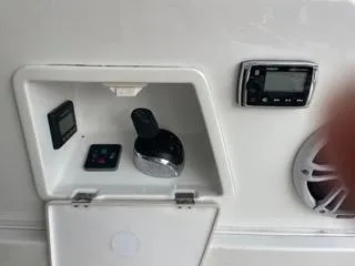 Oasis Yacht Photos Pics Control panel of a 2014 Beneteau GRAN TURISMO 49 yacht, featuring navigation and audio equipment.