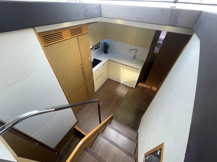 Oasis Yacht Photos Pics Interior view of 2014 Beneteau GRAN TURISMO 49 yacht kitchen area with modern design.