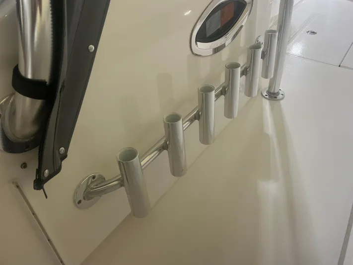  Yacht Photos Pics 2022 Contender 39 ST boat with rod holders and sleek design.