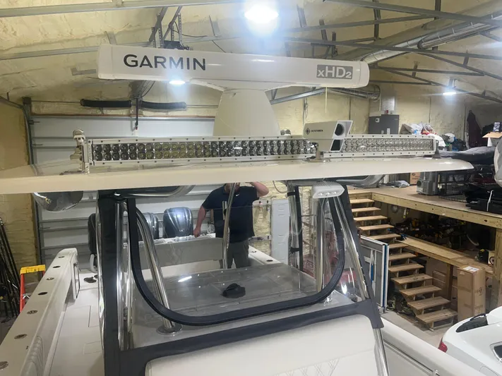  Yacht Photos Pics 2022 Contender 39 ST boat with Garmin xHD2 radar in a garage.