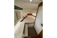 2022 Nimbus C8 cabin interior with cozy bed and modern design.