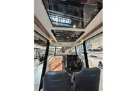 Interior view of 2022 Nimbus C8 boat with panoramic sunroof and modern dashboard.