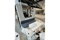 2022 Nimbus C8 boat interior with seating and table, showcasing modern design.