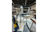 2022 Nimbus C8 boat interior with Mercury engine, displayed at a boat show.