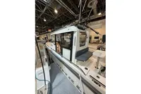 2022 Nimbus C8 boat displayed indoors, showcasing sleek design and modern features.